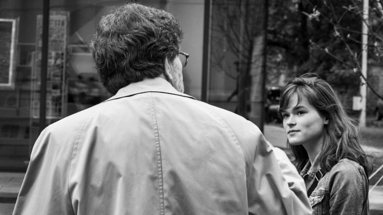 Elly and James walk together in Ukraine.