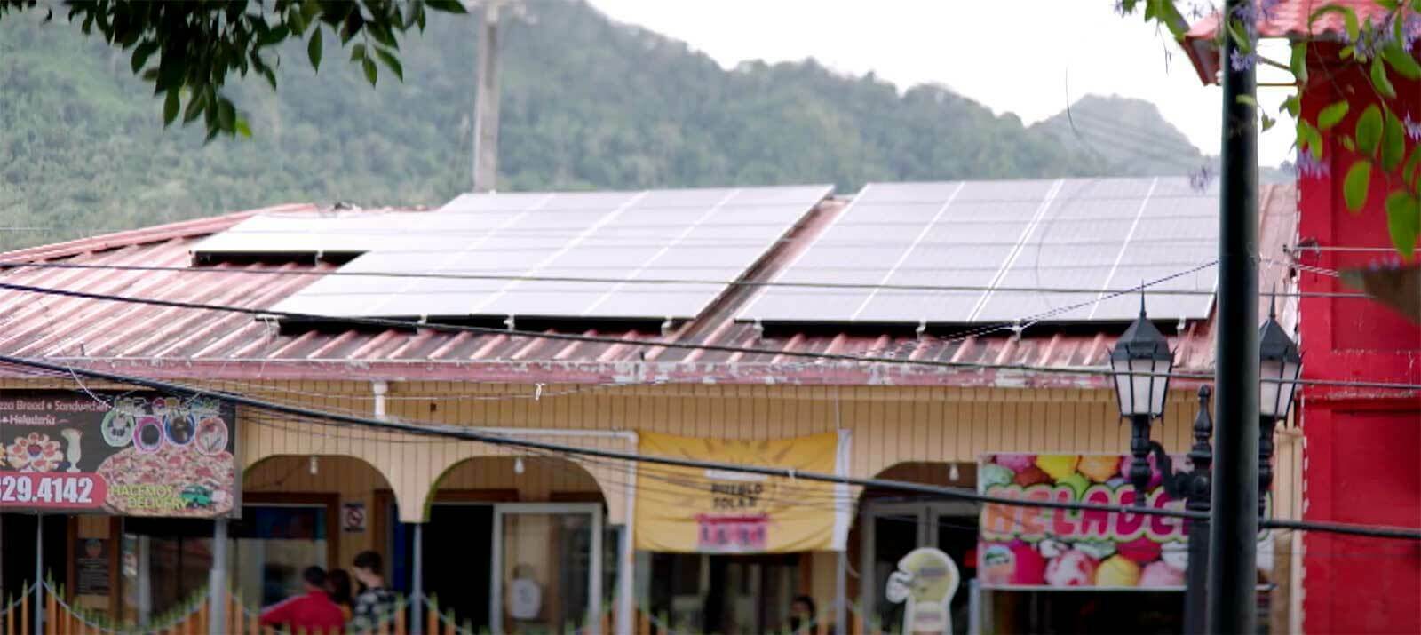Solar panels on top of a building.