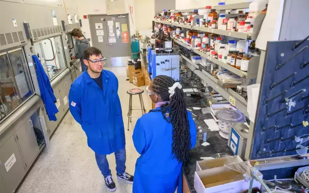 Undergraduate researchers Isaiah Pereira &rsquo;25 and Ainee Martin &rsquo;25 chat in the Helquist lab in Stepan Chemistry.