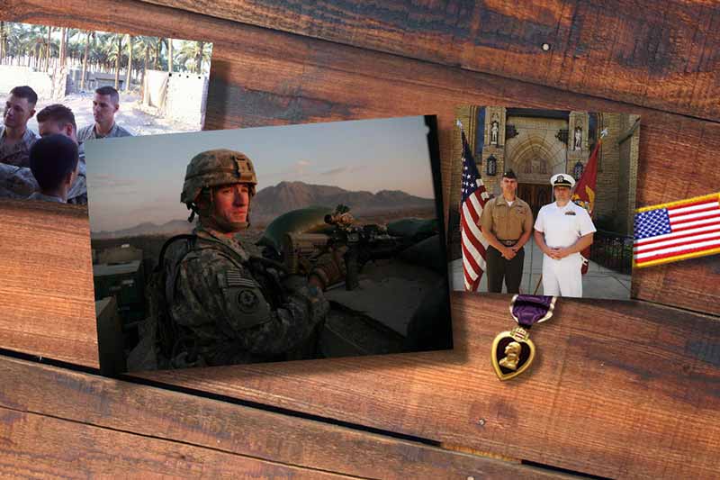 A wooden surface with two photos of military personnel and a Purple Heart medal.