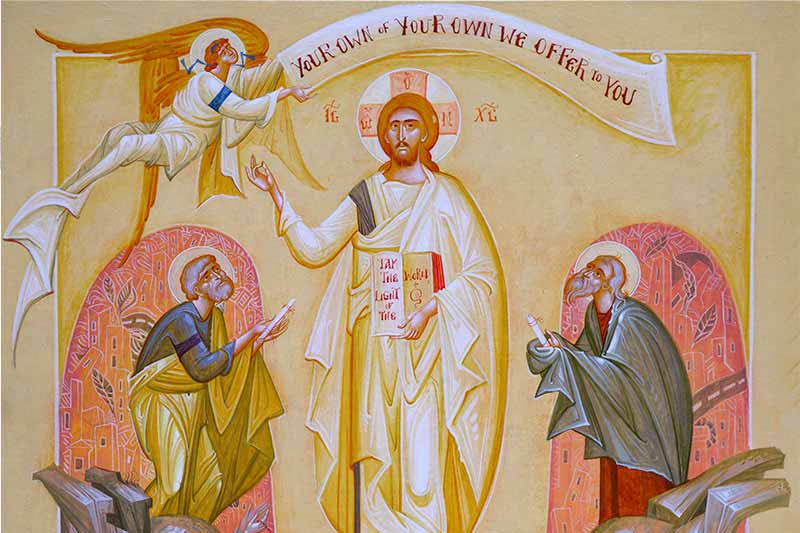 A religious mural depicts Jesus Christ holding a red book while an angel holds a banner above him and two priests look up from below.