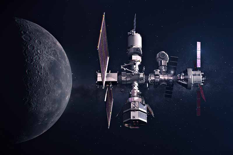 A futuristic space station with solar panels orbits in front of a dark, cratered moon and a starry sky.