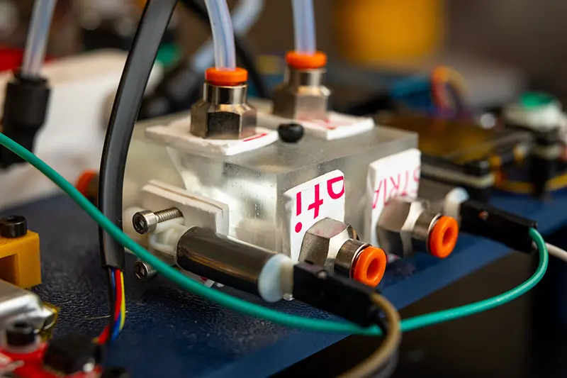 A close-up view of a valve assembly used inside the 'sniffer' device.