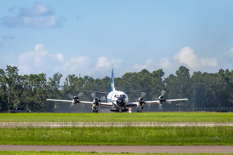The aircraft used in the experiments gettomg readu to take off from an airport runway.