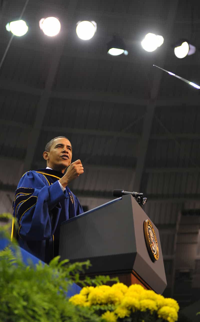Barack Obama giving a speech at a podium.