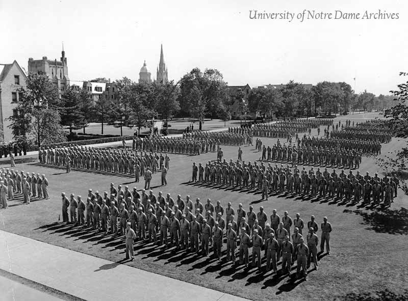 Naval V-7 Military Training Units in formation on South Quad during World War II, 1942.