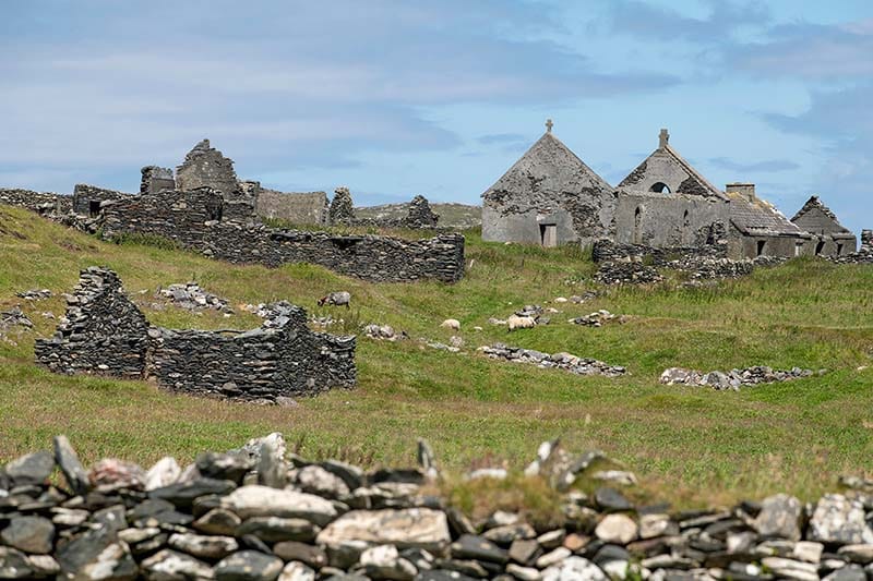 Ancient monastic buildings and wall structures.