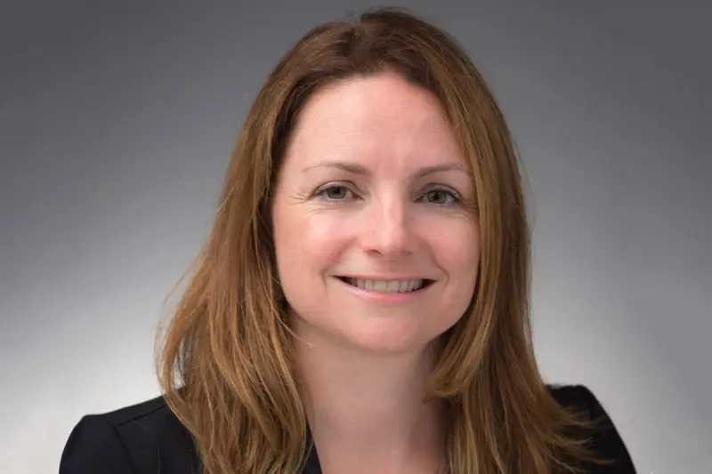 A headshot of Rachel Fulcher Dawson wearing a black blazer.
