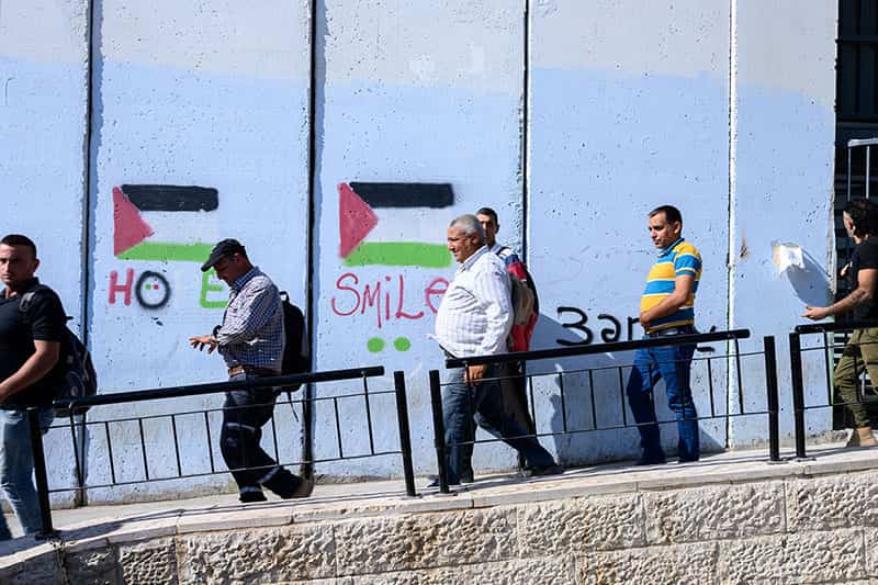 Students follow a tour guide.