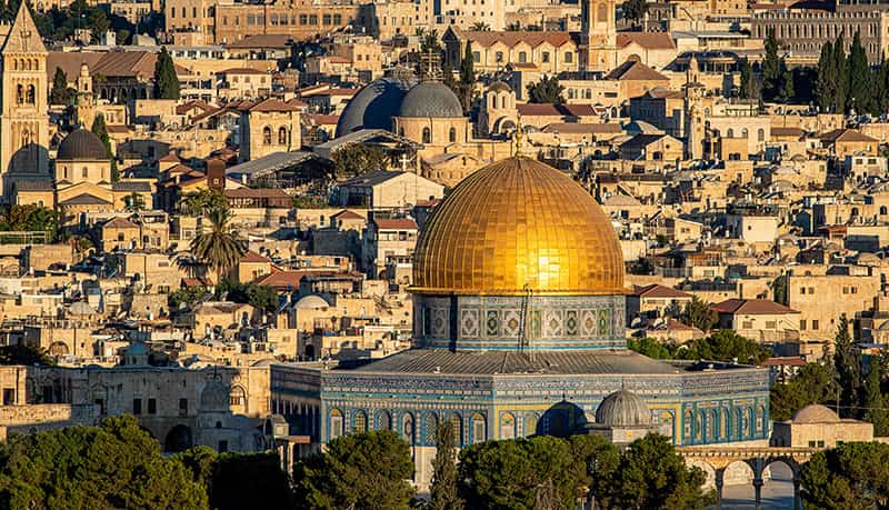 Students follow a tour guide.