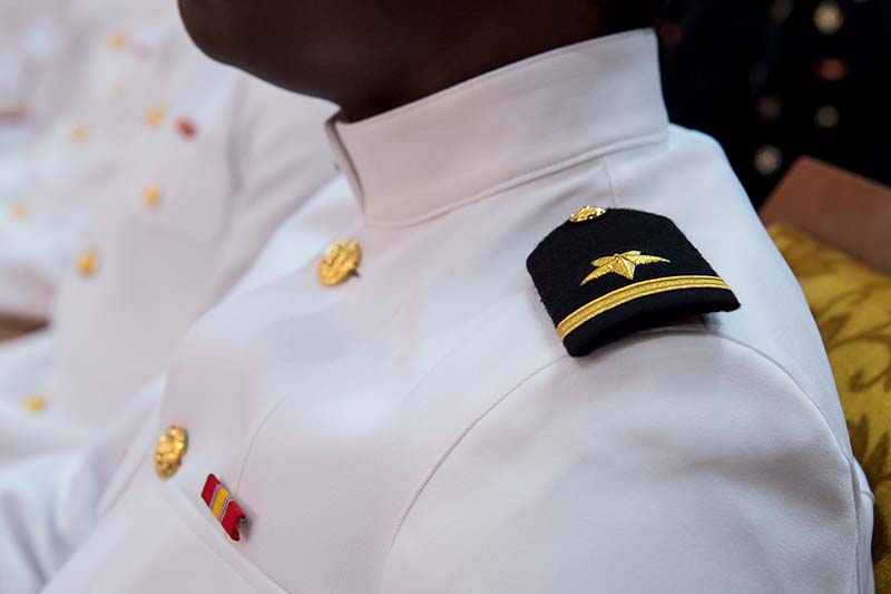 A close-up of the shoulder of a uniformed NROTC member.