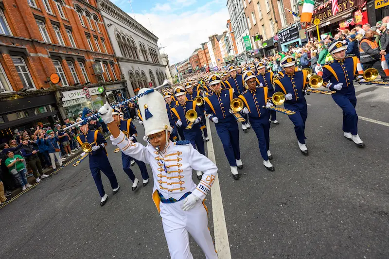 The Notre Dame Marching Band marches along Dame St. (renamed Notre Dame Street for the day) in Dublin, Ireland for their pregame concert ahead of the 2023 Aer Lingus Classic football game.